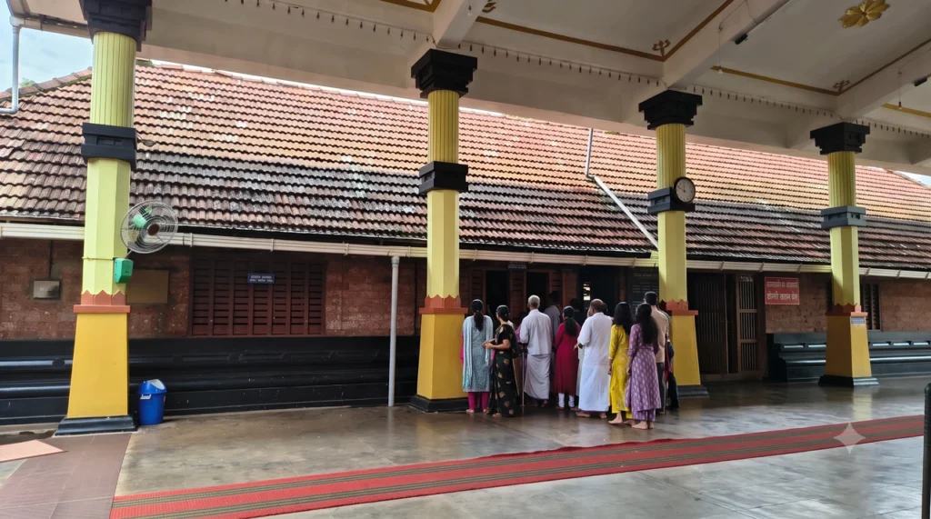 People waiting Subramanya temple Peralassery
